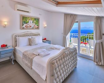 Linda Beach Class Hotel - Boutique Class - קאס - חדר שינה