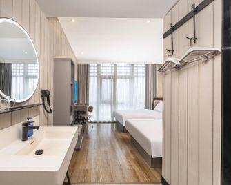 Hanting Hotel Nantong Yongxing - Nantong - Quarto
