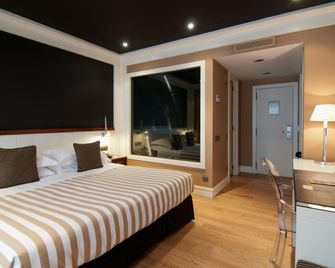 فندق U232 - برشلونة - غرفة نوم