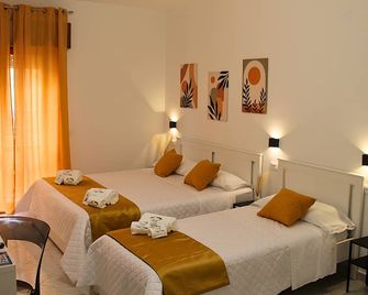 Vida Rooms - Trapani - Schlafzimmer