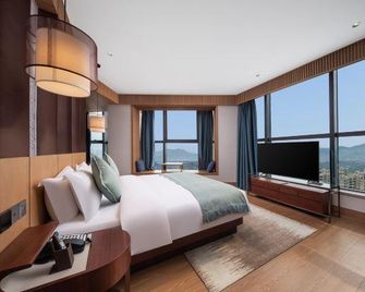 Anji Greenland The Qube Hotel - Huzhou - Bedroom