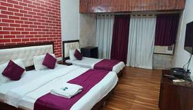 Sts Hometel - Mumbai - Bedroom