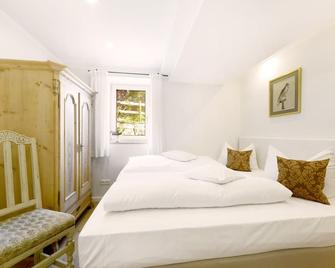 Vacation apartment Leben for 2 persons on the ground floor, 30 sqm, living room/kitchen and bedroom, terrace - Breitbrunn a. Chiemsee - Schlafzimmer