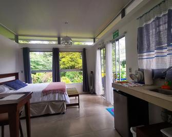Agutipaca Bungalows - Bijagua - Chambre