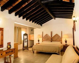 بونجالوز لوليتا - إكستابان دي لا سال - غرفة نوم