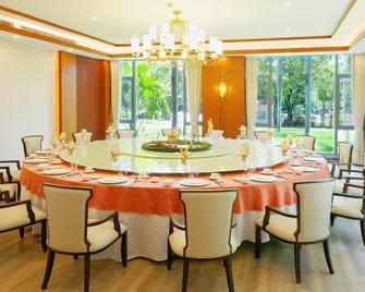 New Tai Garden Holiday Hotel - Xishuangbanna - Restaurace