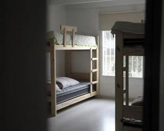 Casa Amonite Hostel Boutique - Puerto Madryn - Yatak Odası