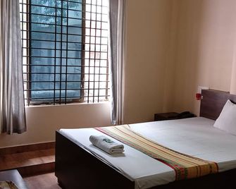 Hotel Tashi By Roh - Dibrugarh - Bedroom