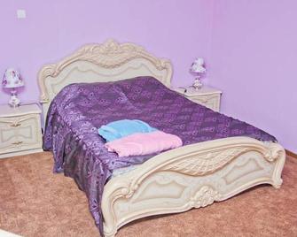 Grand City Hotel - Chita - Camera da letto