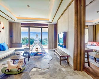 Joyvilla Hotel - Sanya - Wohnzimmer