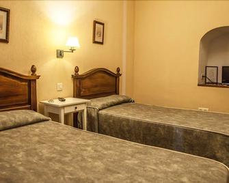 Hostal Mesón Plaza - Trujillo - Schlafzimmer
