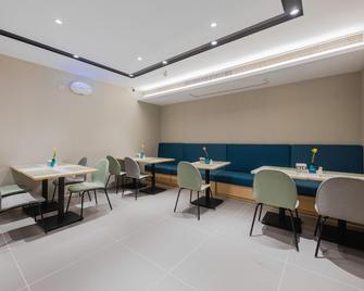 Home Inn Business Hotel (Nanjing Liuhe Xiongzhou Metro Station Jinning Plaza) - Nankín - Restaurante