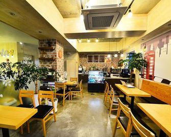 Gyeongju Namu Guesthouse - Gyeongju - Restaurante