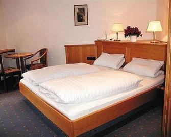 Metzgerei Gasthof Oberhauser - Hotel zur Post - Egling - Schlafzimmer