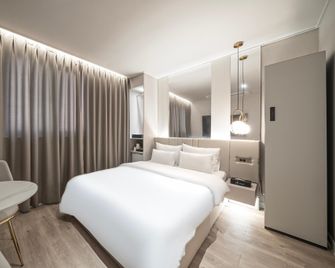 Ji Stay Pohang Daedo-Dong Branch - Pohang - Bedroom