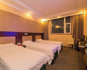 Xichong Mingcheng Holiday Hotel - Nanchong - Bedroom