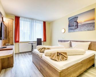 Hotel Kiebitz an der Ostsee - Börgerende-Rethwisch - Bedroom