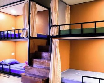 Grace hostel - Chiang Rai - צ'אנג ראי - חדר שינה