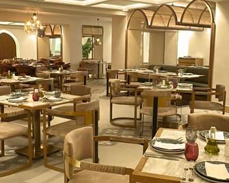 Maroko Bayshore Suites - Lagos - Restoran
