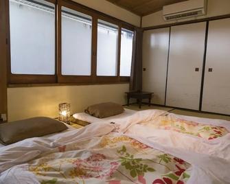 Oki's Inn - Kyoto - Bedroom