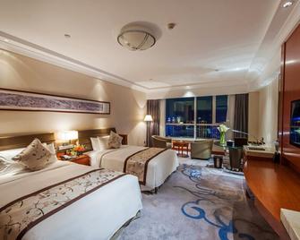 World Trade Winning Hotel - Jilin - Bedroom