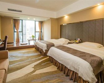 Created Ashton Business Hotel - Wuzhou - Bedroom