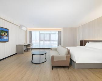 Hanting Hotel Dalian Sports Center - Dalian - Habitación