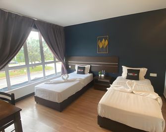 Get Inn Hotel 1 Capital Holdings - Seremban - Slaapkamer
