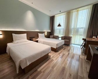 Starway Hotel Urumqi Railway Bureau Metro Station - Ürümqi - Habitación
