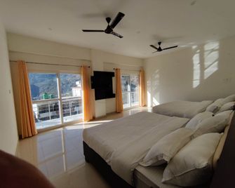 Hotel Nirvanam - Chamoli - Bedroom