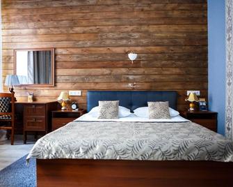 Abazhur Hotel - 托姆斯克 - 臥室