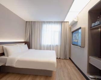 Hanting Hotel Panjin Passenger Station - Panjin - Спальня