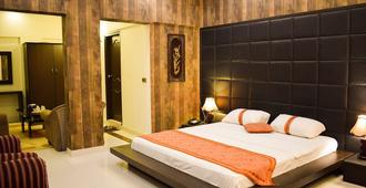 Royal Inn Hotel - Karachi - Bedroom