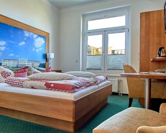 Biohotel Amadeus - Schwerin - חדר שינה