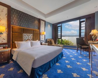 Xichang Qionghai Saibo Mansion Hotel - Liangshan - Schlafzimmer