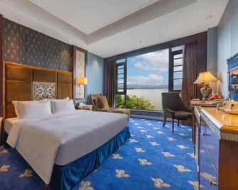 Xichang Qionghai Saibo Mansion Hotel - Liangshan - Bedroom