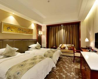 Planet International Hotel - Jingmen - Bedroom