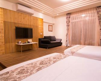 Books & Woods Bed and Breakfast - Taitung City - Chambre