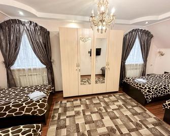 Guest House Milana - Hostel - Yaroslavl - Bedroom
