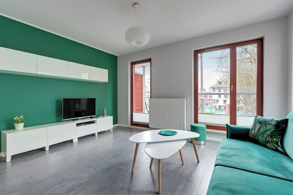 جارنيزون آند باركينج باي داون تاون أبارتمنتس - غدانسك - غرفة معيشة