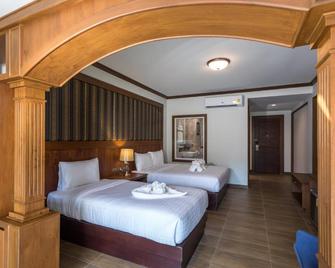 Le Erawan Phang Nga Hotel - Phangnga - Schlafzimmer