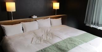 Niigata Keihin Hotel - נייגאטה - חדר שינה
