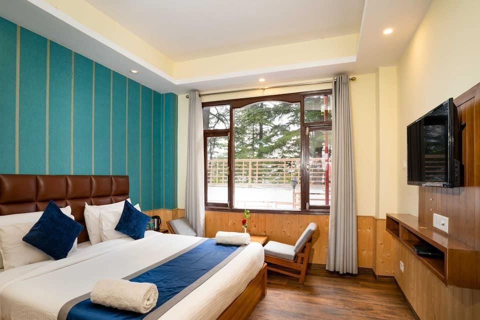 هوتل وودرينا - شيملا - غرفة نوم