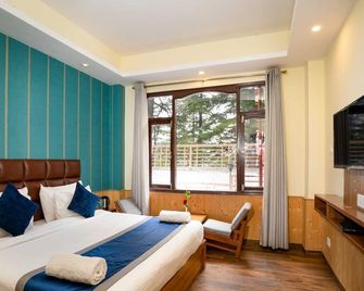 هوتل وودرينا - شيملا - غرفة نوم