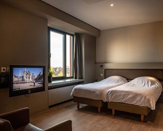 آبارتهوتل كاستلينو - غينت - غرفة نوم