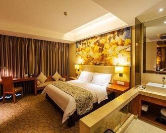 Jinjiang Metropolo Hotel - Taizhou Wanda Plaza - Taizhou - Bedroom