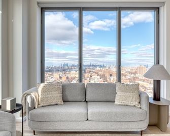 Gorgeous Clinton Hill 2BR w/ Gym, Pool & W/D, nr Barclays, by Blueground - Brooklyn - Living room