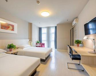 Jingjiang Inn Hotel Tianjin Zhongxin Eco-City Branch - Tianjin - Schlafzimmer