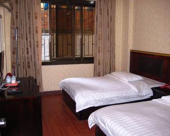 Guilin Xinxin Hotel (Guilin Railway Station Shop) - Guilin - Bedroom