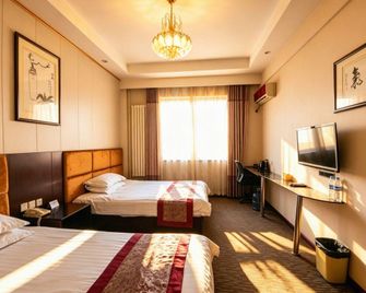 Super 8 by Wyndham Jinan International Airport - Jinan - Habitación